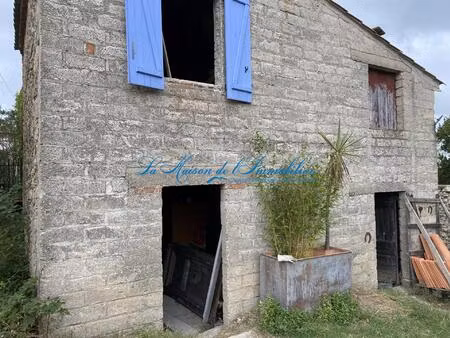 grange à rénover d’environ 130 m2 sur un terrain constructible de 1 100 m2