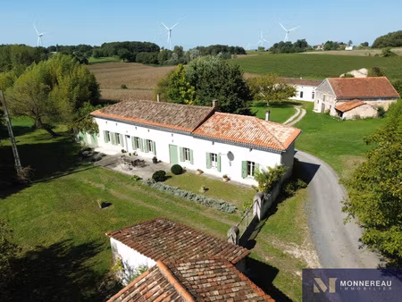 maison en pierre de plain pied avec terrain ideal pour cheva