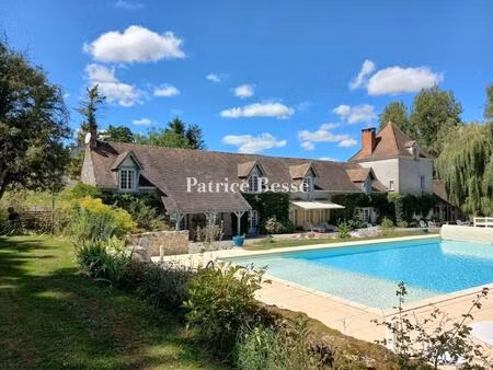 en touraine  aux abords d'un village et dans un parc de 2 9 ha avec étang  un moulin fondé