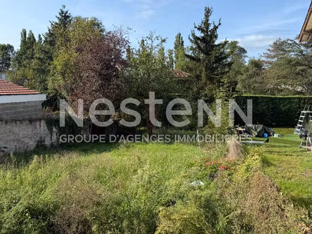 a feurs  proche du centre  parcelle de terrain de 321 m2  dont 271 m2 de surface construct