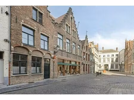 propriété commerciale avec maison à vendre à bruges