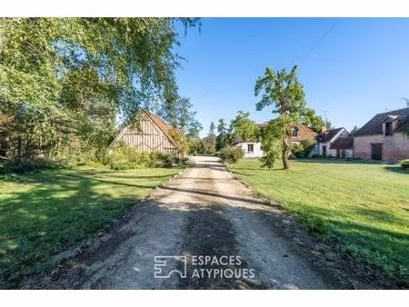 propriété du xieme siècle et ses dépendances sur plus de 5 hectares