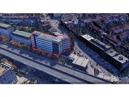 immeuble de bureaux de +/- 2400 m² + parkings en sous-sols