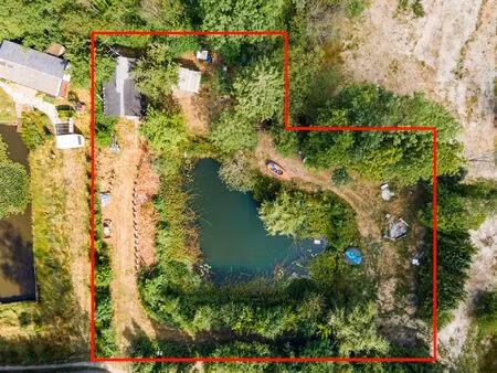 chalet met 2 slpks op 2.710 m² recreatiegrond in vorselaar.