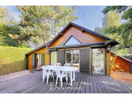 chalet en bois avec vue lac dans un domaine privé
