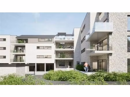 appartement avec terrasse  cave et parking.