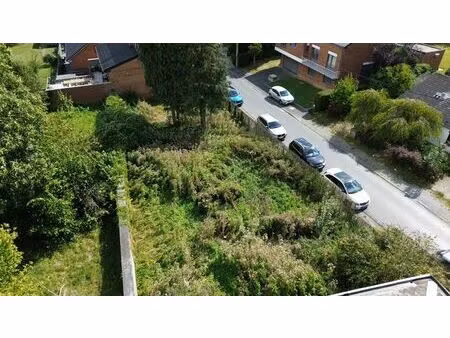 terrain avec permis en cours pour 2 appartements et garages