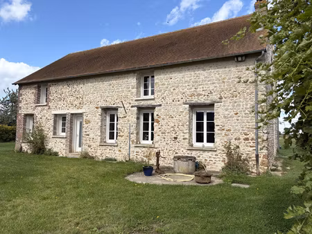 bâtisse d'un ancien corps de ferme rénovée