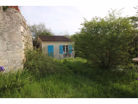 terrain avec bâtisse