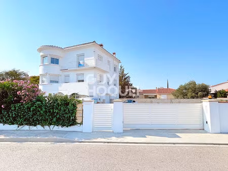 toulouges immeuble 4 faces  3 appartements  un garage + terrain encore constructible