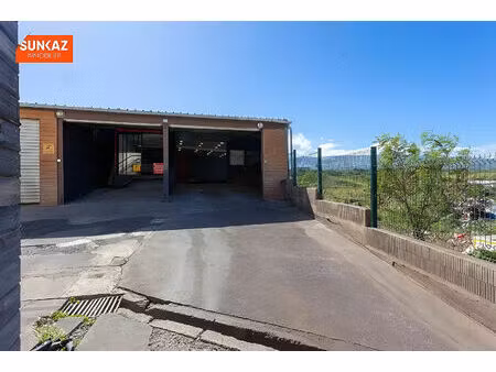 a louer- st pierre-local commercial 120 m²+stationnements-zone industrielle-excellente vis