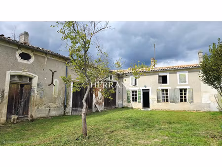 ensemble immobilier avec maison  grange et dépendances en