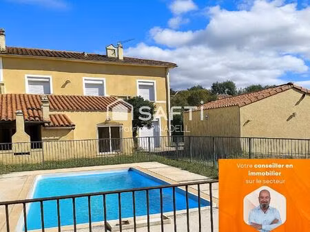 maison d'habitation 3 faces  4 chambres  garage  jardin et piscine