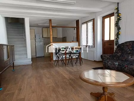 appartement de 62m²sur 2 niveaux avec jardinet et caves