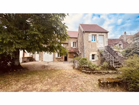 maison de caractère en pierres apparentes située dans le secteur d' asquins au prix de 235