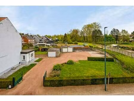 terrain à bâtir  11a 31 ca  centre vossem. a visiter!