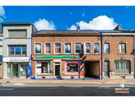 commerce-appartement duplex+8 garages-rentabilite incroyable