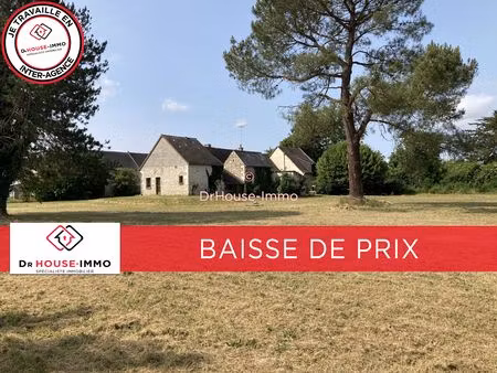 ensemble de 2 maisons avec dépendances sur grand terrain plat