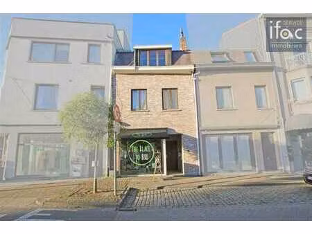immeuble de rapport avec 2 flats et espace commercial