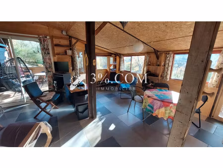 maisonnette bois sur 1900 m2 de terrain