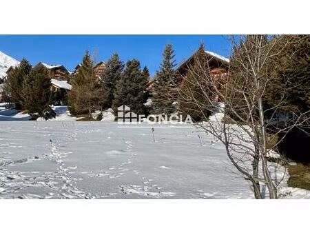 la toussuire – terrain a batir 777 m² - situation idéale  à proximité immédiate du centre 