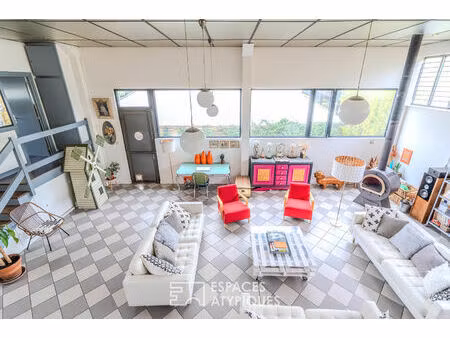ancien garage automobile transformé en loft à proximité de la gare de carrières sur seine