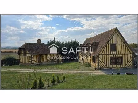 propriété normande avec 3 maisons  vue dégagée.