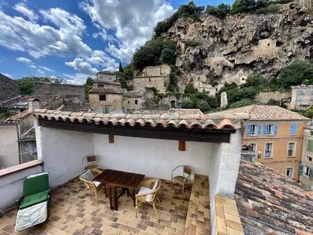 appartement avec terrasse de toit et studio indépendant