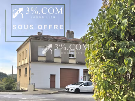 maison de village comprenant un appartement de 67m2  un garage de 72m2 en rdc +2 garages d