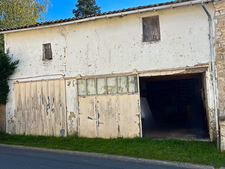 garage d'une superficie de 65 m²