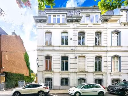 maison de caractère divisée en 4 unités  terrain 10 ares 30