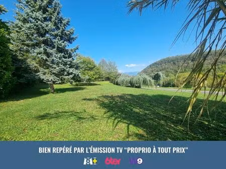 maison avec 2 apparts dans un parc arbore