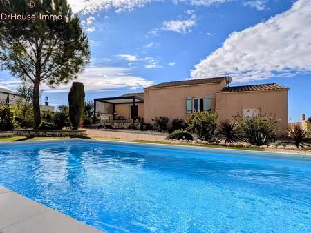 charmante maison familiale de 4 pièces avec jardin paysager et piscine à lézan