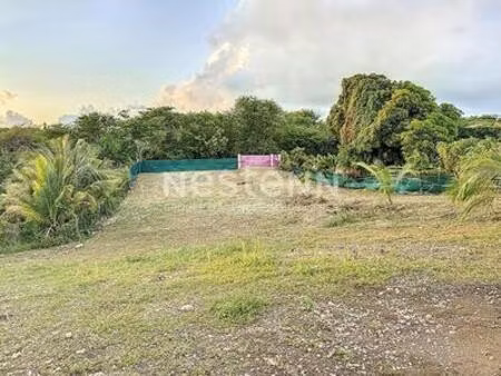 à vendre terrain de 400m2 constructible à gissac sainte-anne proche de la plage de bois-jo
