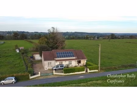 maison de plain-pied  4 chambres  sur une parcelle de 1600 m²