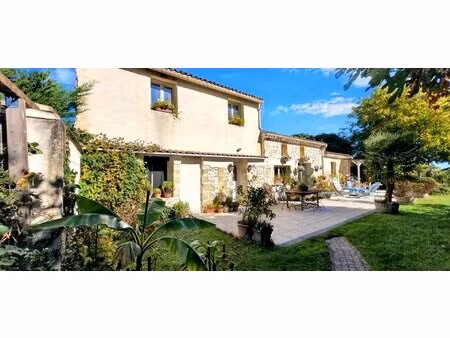 33710 teuillac - maison en pierres 195m² habitables et 1265 m² parc paysager