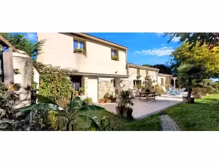 33710 teuillac - maison en pierres 195m² habitables et 1265 m² parc paysager