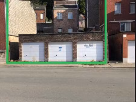 3 garages + terrain à bâtir