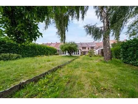maison 3 façades avec entrepôt  terrasse et jardin à elouges