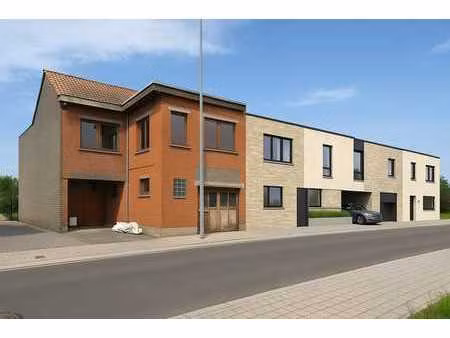 bedrijfsgebouw met bovenliggend appartement te sint-elooi...