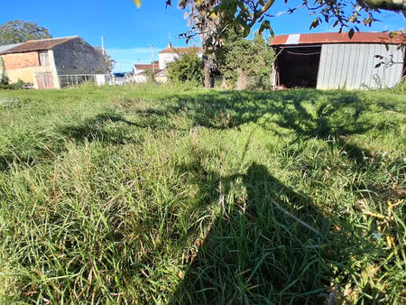terrain à bâtir de 397m2 dans une ensemble de 732m2 non cloturé