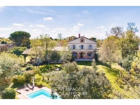 ancienne école de caractère avec gîte et parc au bord du lac à launac
