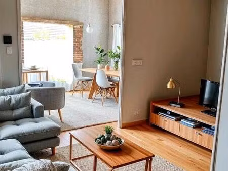 bâtiment viabilisé avec potentiel d'aménagement dans un environnement calme et verdoyant -