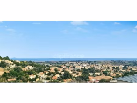 appartement t5 de 124 m2 avec vue panoramique sur la mer et son jardin à folelli
