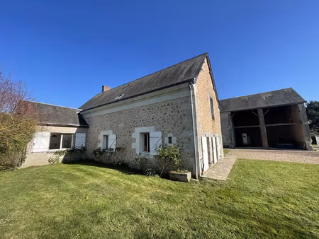 propriété avec grange sur terrain de 2400 m2.