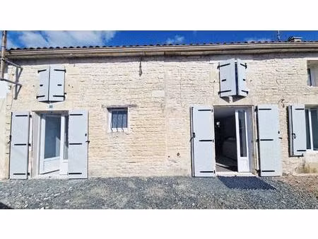 maison rénovée avec le charme de la pierre