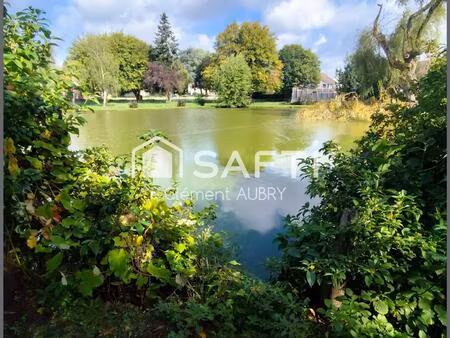venez découvrir cette maison pleine de charme  nichée sur un terrain exceptionnel avec son