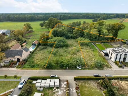 unieke villagrond met zicht op agrarisch gebied in heppen