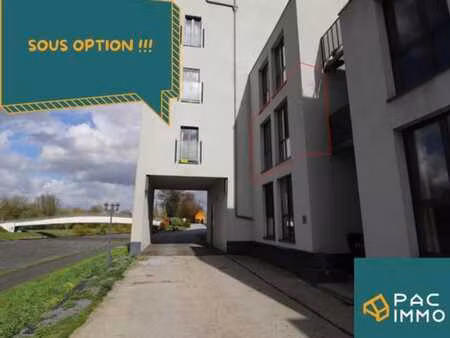 appartement de +/- 60m²  2 ch. 1 cave  park. ext.1v.