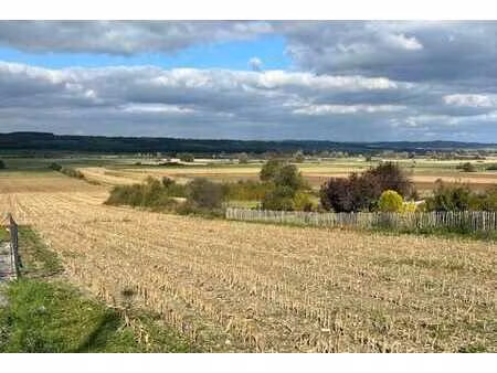 terrain à bâtir idéalement situé avec magnifique vue dégagée